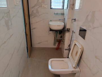 Bathroom in 3 BHK Apartment at Rutu Estate, Brahmand – for Sale