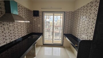Kitchen in 2 BHK Apartment at Mangala Residency, Taloja – for Rent