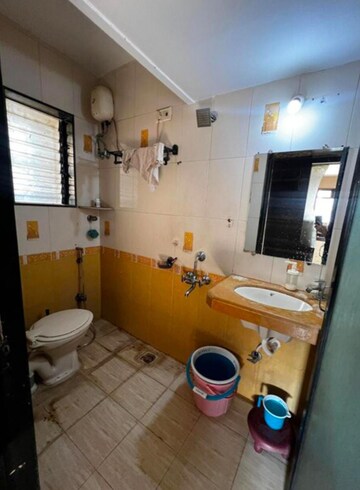 Bathroom in 1 BHK Apartment at HDIL Dheeraj Residency, Goregaon West – for Rent