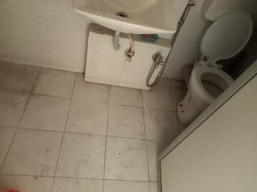 Bathroom in 2 BHK Apartment at Tanvi Eminence, Mira Road – for Rent