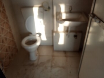 Bathroom in 2 BHK Apartment at Tanvi Eminence, Mira Road – for Rent
