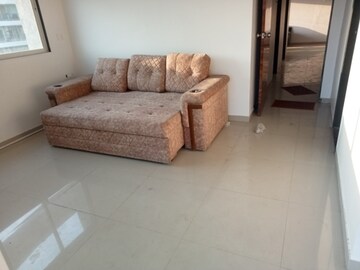 Living Room in 2 BHK Apartment at Tanvi Eminence, Mira Road – for Rent