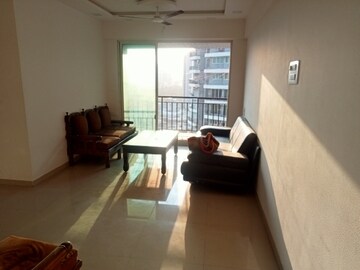 Living Room in 2 BHK Apartment at Tanvi Eminence, Mira Road – for Rent