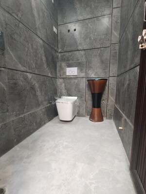 Bathroom in 3 BHK Builder Floor at Dwarka Mor – for Sale