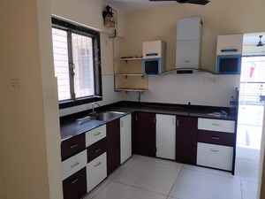 Kitchen in 2 BHK Apartment at Nakshatra Swastik Alps, Brahmand – for Sale