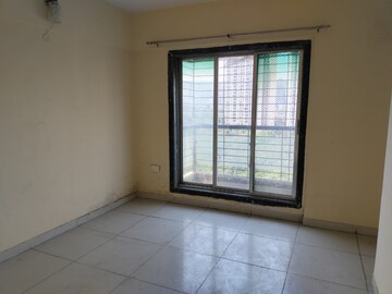 Room in 2 BHK Apartment at Nakshatra Swastik Alps, Brahmand – for Sale