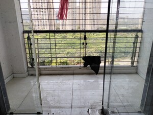 Room in 2 BHK Apartment at Nakshatra Swastik Alps, Brahmand – for Sale