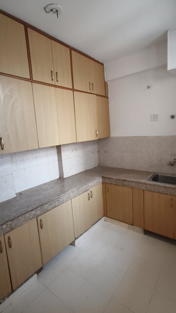Kitchen in 2.5 BHK Apartment at Mahagun Mahagunpuram, Shastri Nagar – for Sale
