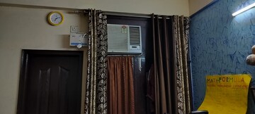 Bedroom in 2 BHK Builder Floor at Shri Devaji Residency, Dhakoli Village – for Rent