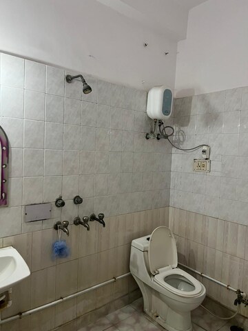 Bathroom in 3 BHK Apartment at Shalimar Garden Extension 2 – for Sale