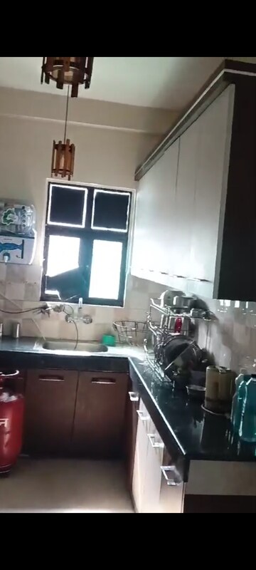 Kitchen in 3 BHK Apartment at Divyansh Fabio, Dundahera – for Sale