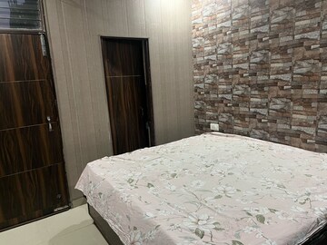 Bedroom in 3 BHK Builder Floor at Shri Devaji Residency, Dhakoli Village – for Rent