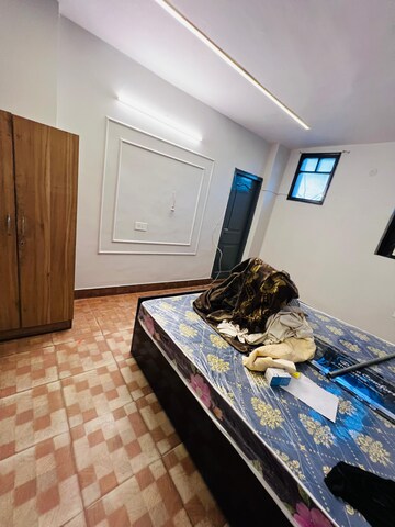 Bedroom in 3 BHK Builder Floor at Sector 16a – for Rent