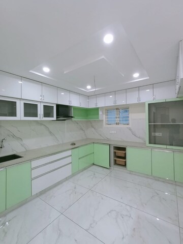 Kitchen in 3 BHK Apartment at Tarakarama Nagar – for Sale