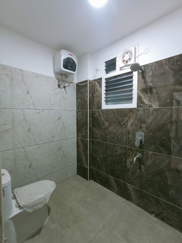 Bathroom in 3 BHK Apartment at Tarakarama Nagar – for Sale