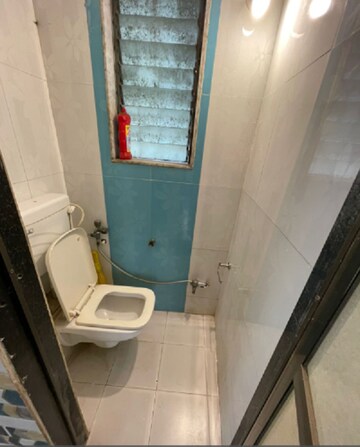 Bathroom in 1.5 BHK Apartment at Christine Heights, Mira Road – for Rent