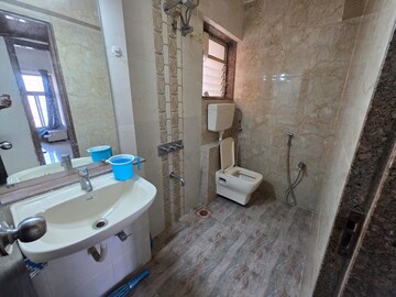 Bathroom in 2.5 BHK Apartment at Kanakia Spaces Niharika, Manpada – for Rent
