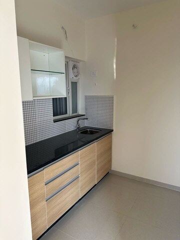 Kitchen in 2 BHK Apartment at Omkar Signet, Malad East – for Rent