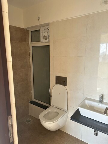 Bathroom in 2 BHK Apartment at Omkar Signet, Malad East – for Rent