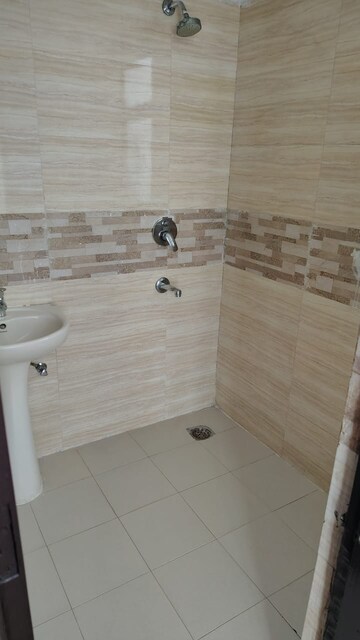 Bathroom in 3 BHK Apartment at Amrapali Zodiac, Sector 120 – for Sale