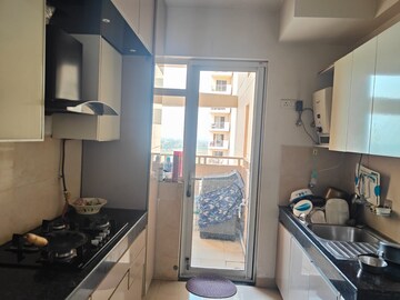 Kitchen in 3 BHK Apartment at Microtek Greenburg, Sector 86 – for Sale