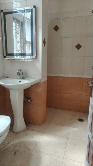 Bathroom in 3 BHK Apartment at Microtek Greenburg, Sector 86 – for Sale
