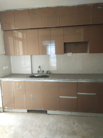 Kitchen in 4 BHK Apartment at Kbnows Apartment, Sector 16 Greater Noida – for Rent