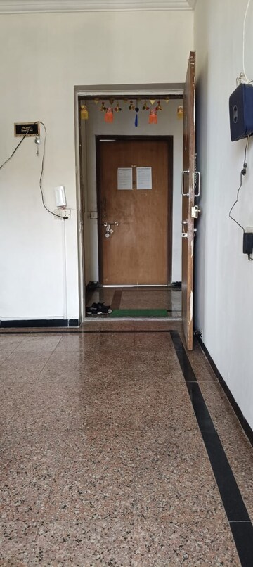 Building Lobby in 1 BHK Apartment at Royal Palms, Goregaon East – for Rent
