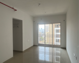 Living Room in 1 BHK Apartment at JP North Alexa, Hatkesh Udhog Nagar – for Sale