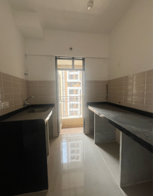 Kitchen in 1 BHK Apartment at JP North Alexa, Hatkesh Udhog Nagar – for Sale
