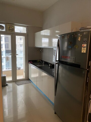 Kitchen in 3 BHK Apartment at Omkar Alta Monte, Malad East – for Rent