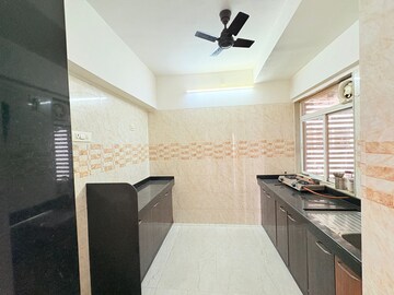 Kitchen in 2 BHK Apartment at The Baya Goldspot, Andheri East – for Rent
