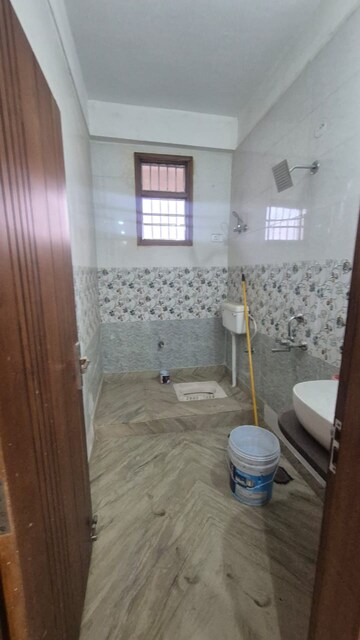 Bathroom in 4 BHK Builder Floor at Shakti Khand – for Rent
