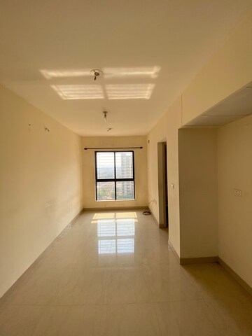 Living Room in 1 BHK Apartment at Lodha Crown Quality Homes Dombivli, Dombivli East – for Rent