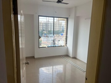 Room in 2 BHK Apartment at Gulmohar Goldcoast, Kharadi – for Rent