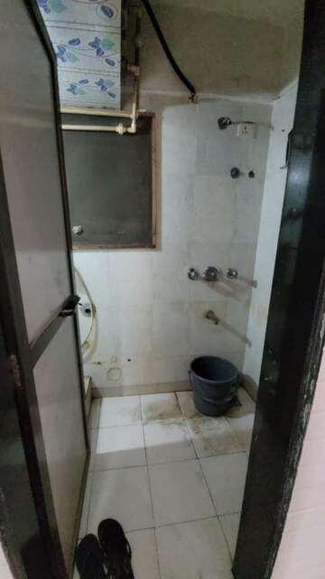 Bathroom in 2 BHK Apartment at Evershine Pine CHS, Mira Road – for Sale