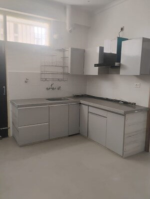 Kitchen in 2.5 BHK Apartment at Gulmohur Garden, Raj Nagar Extension – for Sale