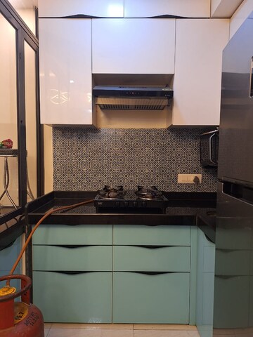 Kitchen in 1 BHK Apartment at Lodha Crown Quality Homes, Majiwada – for Rent