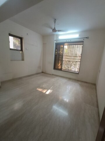 Room in 2 BHK Apartment at Khar West – for Rent