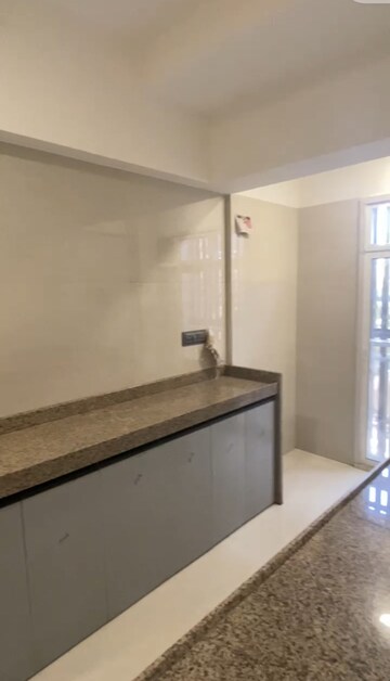 Kitchen in 1 BHK Apartment at Salasar Courtyard, Mira Road East – for Sale