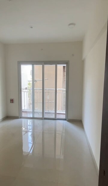Living Room in 1 BHK Apartment at Salasar Courtyard, Mira Road East – for Sale