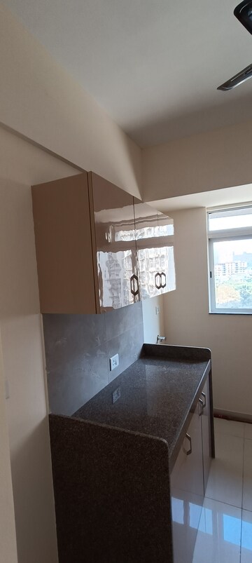 Kitchen in 1 BHK Apartment at Godrej Nest Kandivali, Kandivali East – for Rent