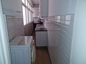 Kitchen in 4 BHK Apartment at Mahagun Mascot, Sain Vihar – for Sale