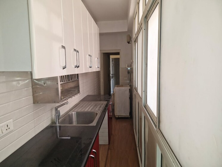 Kitchen, mahagun-mascot 4 Bedroom 2215 Sq.Ft. Apartment In Sain Vihar Ghaziabad 8407657