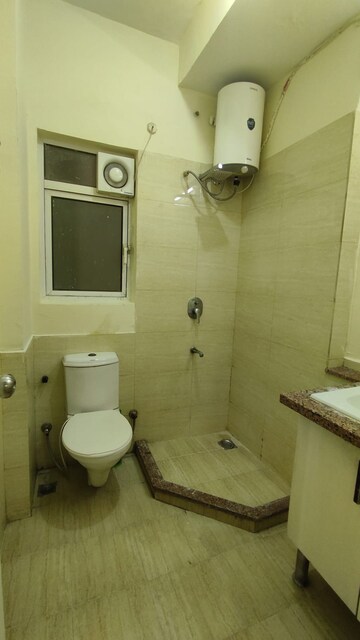 Bathroom in 3 BHK Apartment at Moti Nagar – for Rent