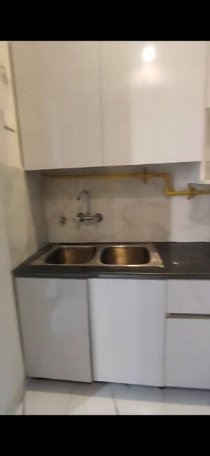 Kitchen in 3 BHK Apartment at T Homes Phase 1, Siddharth Vihar – for Sale