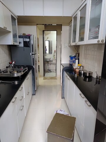 Kitchen in 1 BHK Apartment at Ekta Meadows, Borivali East – for Sale