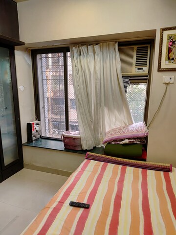 Bedroom in 1 BHK Apartment at Ekta Meadows, Borivali East – for Sale