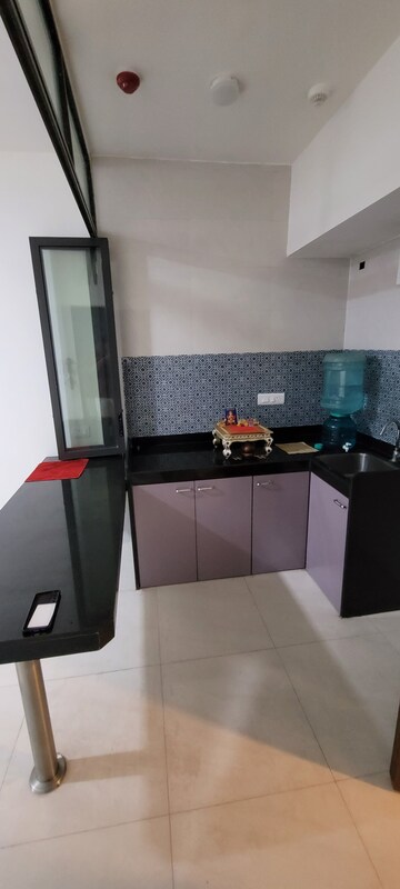 Kitchen in 1 BHK Apartment at Lodha Quality Home Tower 5, Majiwada – for Rent