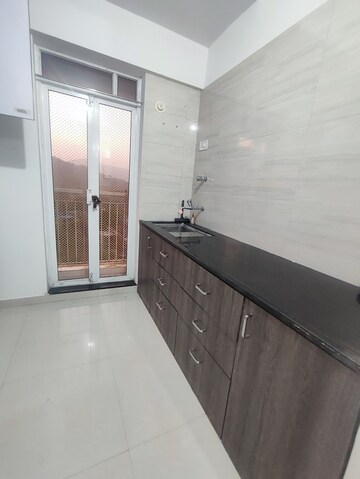Kitchen in 2 BHK Apartment at Puranik Aarambh, Ghodbunder Road – for Rent